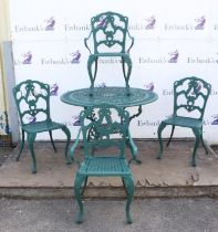 Green painted metal circular garden table and four matching chairs. 70 cm height, 110 cm diameter,