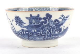 Chinese export blue and white bowl, 18th Century, decorated with blue and white scenes of a pagoda