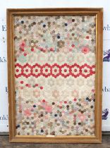 A late Victorian patchwork quilt, within a moulded velvet covered outer frame, H 170cm, W 119cm