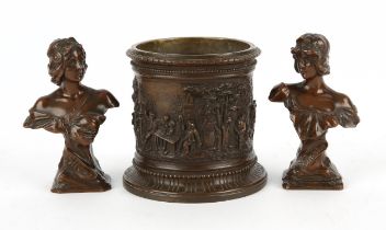 A late 19th century bronze sleeve vase, embossed with 17th century scenes of revelry, diam.