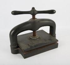 Cast iron book press, 33cm high