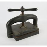 Cast iron book press, 33cm high