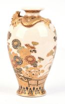 A Satsuma tapering oviform vase with a gilt dragon in high relief coiled around the neck; decorated