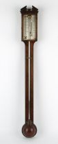 George III walnut stick barometer by C Tagliabue, with broken arch cresting, above silvered dial,