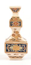 A small Satsuma vase on square base; decorated in gosu blue, colours and gilt with sprays of kiku;