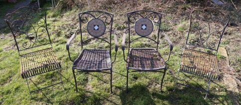 Pair of metal garden chairs, with circular ceramic mosaic splats, and faux basket weave seats,