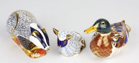 Royal Crown Derby, a Woodland Badger with gold stopper, boxed, a Mallard duck with gold stopper,