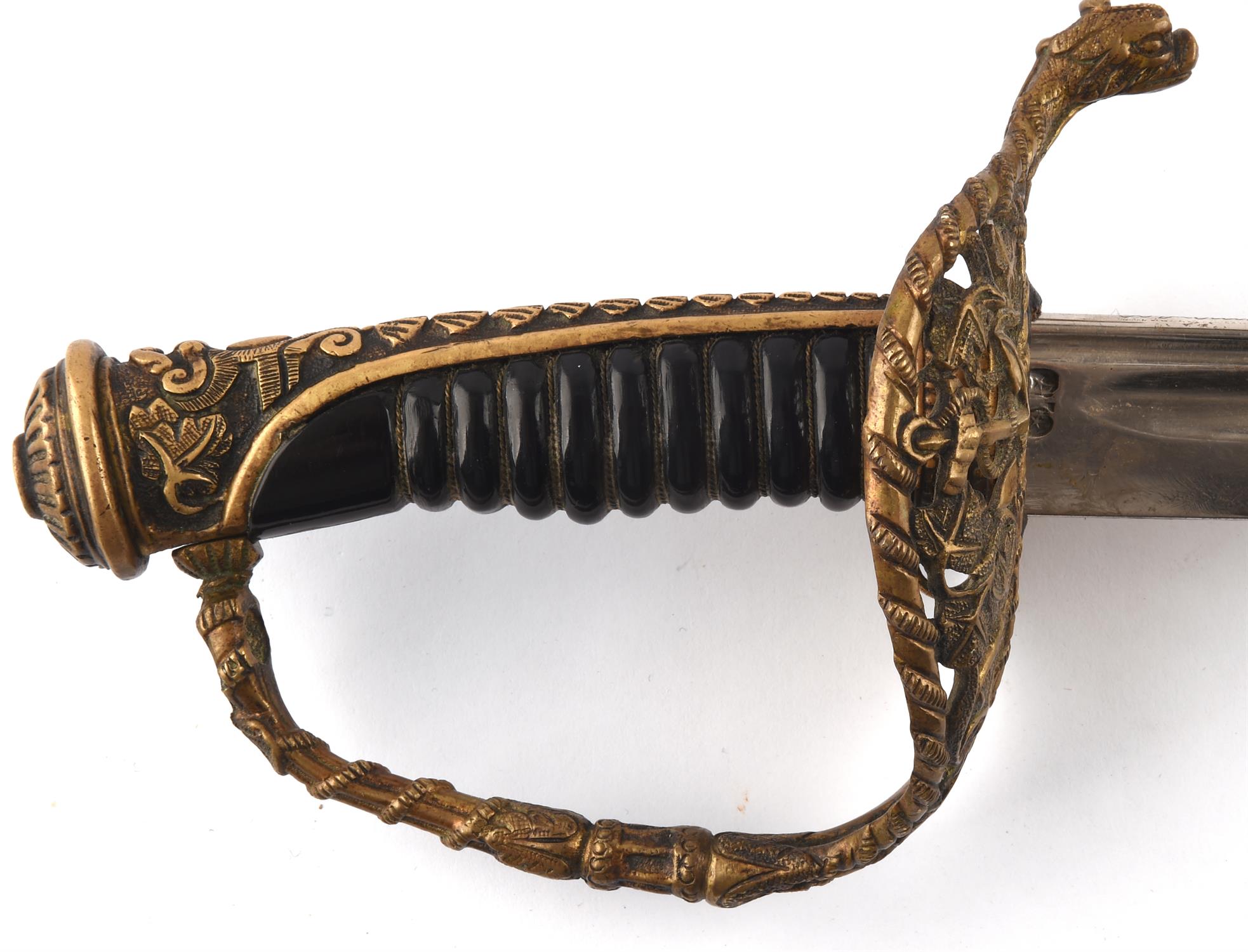 A 19th century French Naval officers sword with slightly curved steel blade (70cm),