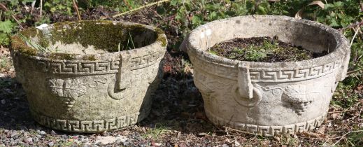 Pair of reconstituted stone planters, moulded with bands of Greek key designs and baskets of fruit,