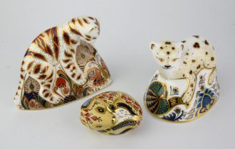 Royal Crown Derby, Bengal Tiger cub with gold button, boxed, a Sinclair's Leopard club with gold