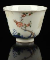 Kangxi Style: An underglaze blue and enamel, 'Lunar Month style', wine cup decorated with a