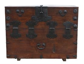 A Korean stained oak, pine and iron mounted chest, the fall front revealing a paper lined interior