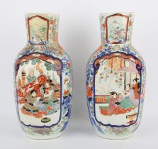 A pair of Japanese vases, early 20th century, with narrative panels and flowering prunus,