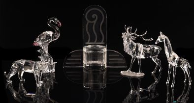 Swarovski, glass models of a giraffe, a tiger, a stag, a flamingo, together a screw top jar and