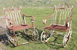 Pair of wrought iron and painted garden rocking chairs, 88cm high (2)