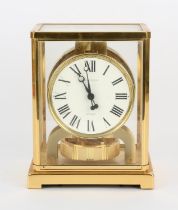 A Jaeger Le Coultre gilt brass cased Atmos clock. Serial number 366466. Cased and with