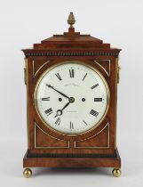 A Late 19th century mahogany cased bracket clock. The white enamelled dial detailed ROBERT BRYSON