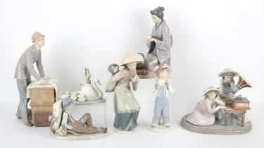 Seven Lladro figures including ; 'Music Time, 'Architect', 'My Precious Bundle', 'August Moon',