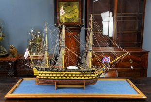A model of the HMS Victory in Perspex case, the model ship approximately 92cm high x 120cm long x