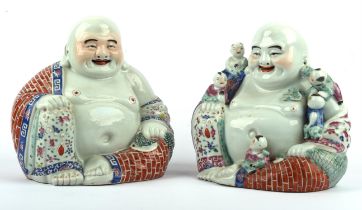 Two famille rose figures of Budai He Shang, the Monk of Chan Buddhism, identified with Maitreya.