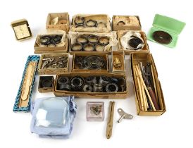 A quantity of assorted carriage and other clock springs, together with tools, keys;; and sundry