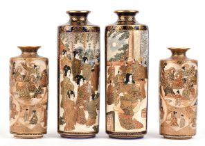 Two pairs of Satsuma vases; each pair of cylindrical form and decorated with figures from the Edo