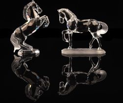 Swarovski, Rearing horse, together with another model of a prancing horse, both cased (2) Note: The