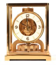A Swiss gilt-brass 'Atmos' clock by Jaeger Lecoultre, Geneva, late 20th Century, the circular dial