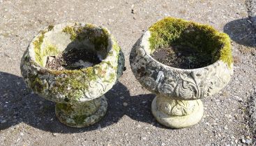 Pair of reconstituted stone planters, moulded with foliage, on pedestal base, 38cm high x 40cm