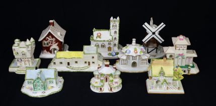Coalport model of the Village Church, 14cm high, together fifteen other Coalport models of various