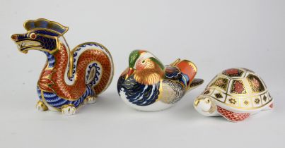 Royal Crown Derby, a Dragon paperweight with gold button, boxed, a Mandarin Duck paperweight with