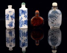 Four Chinese snuff bottles, comprising: two in blue and white [one marked with Tongzhi mark; the