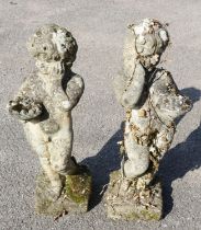 Pair of reconstituted stone cherubs, holding baskets of flowers, 73cm high (2)