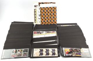 GB quantity of presentation cards of modern QEII sets unmounted mint, plus complete sheets of
