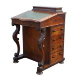 Victorian walnut Davenport, with green lather top, lifting to reveal a fitted interior,