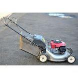 Honda petrol mower. Please note this lot has the standard Ewbank's standard buyers premium payable