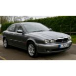 2002 Jaguar X-Type V6 Saloon. Registration number: LJ52 LHN Mileage: 94,400. Gunmetal Metallic