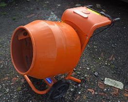 Bella orange electric cement mixer. Please note this lot has the standard Ewbank's standard buyers