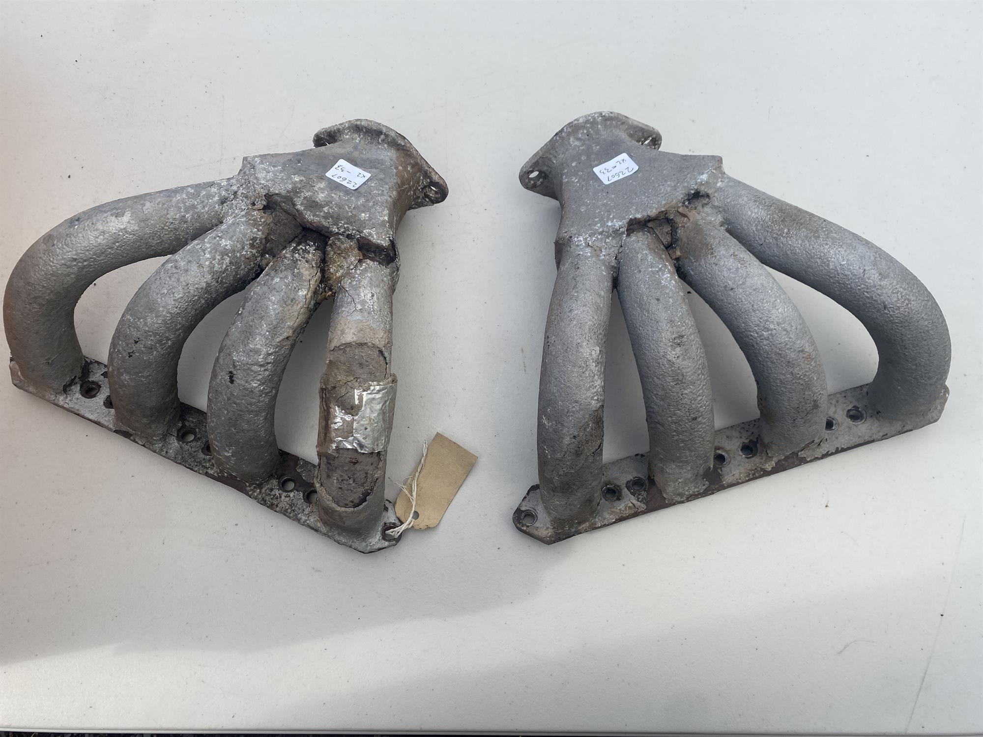 Pair of vintage Bugatti type 44 straight 8 exhaust manifolds, as found condition.