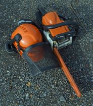 Stihl MS 170 petrol chainsaw with Stihl protective helmet. Please note this lot has the standard