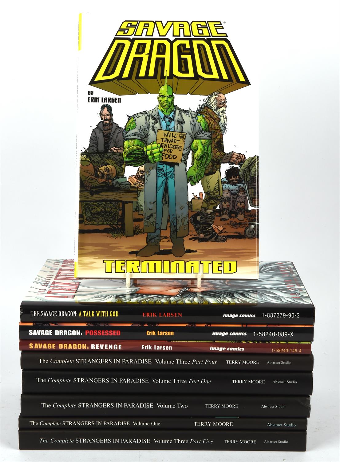 A collection of Savage Dragon & Strangers in Paradise Hardcovers All in excellent,