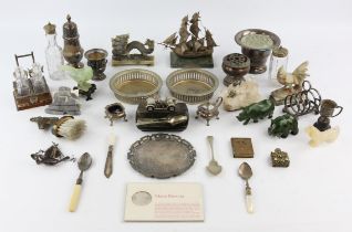 A group of small collectable items including ; a silver plated oak four bottle cruet set,