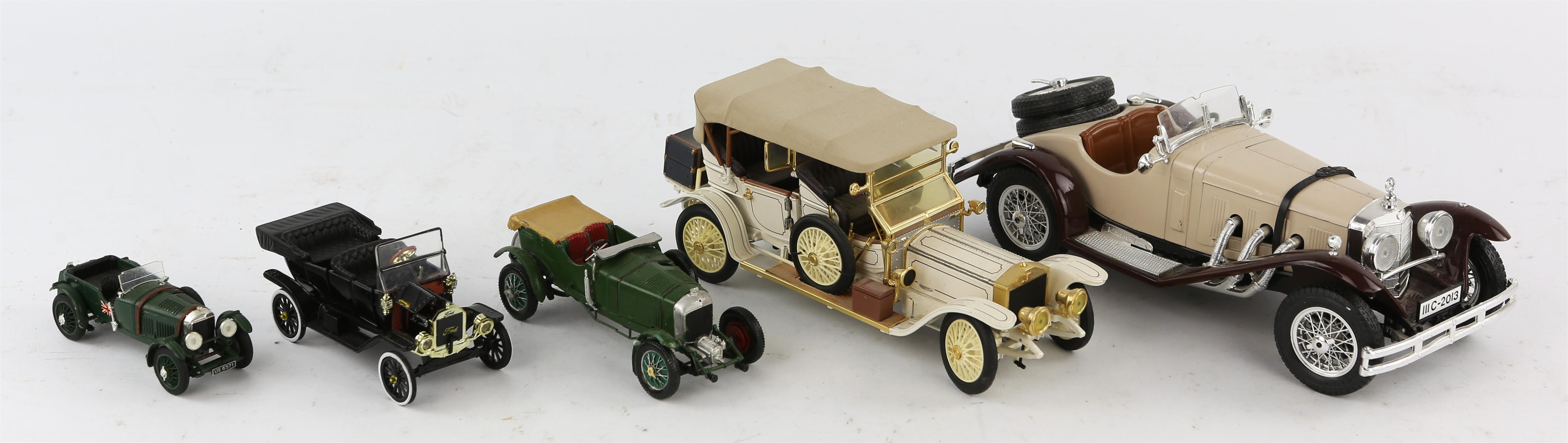 A small collection of Royal Doulton Toby character jugs, Hummel figures and scale model toy cars. - Image 2 of 2