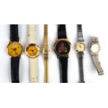 Two millennium commemorative wristwatches marked 'Berlin 2000' and four other fashion watches.(6)