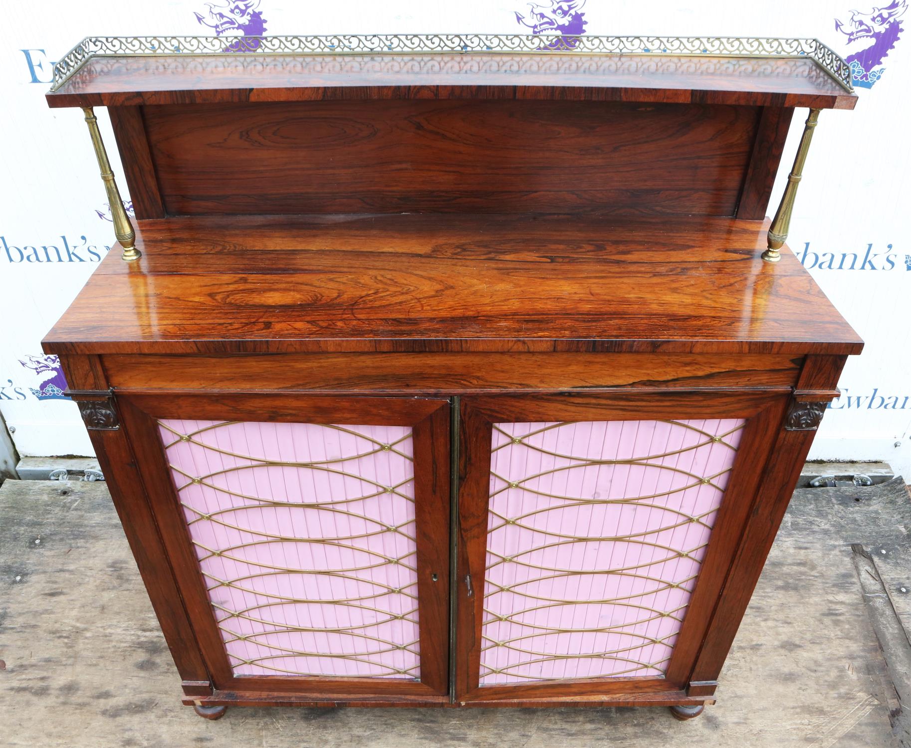 A Regency rosewood side cabinet, the rear gallery on brass supports, the narrow drawer above a pair - Image 4 of 5