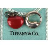 A silver Links of London red enamel heart charm, together with a Tiffany & Co, Elsa Peretti pendant