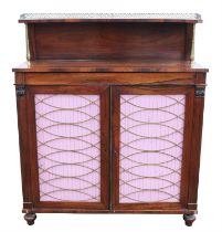 A Regency rosewood side cabinet, the rear gallery on brass supports, the narrow drawer above a pair