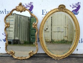A George III style giltwood and gesso oval mirror, early 20th century, plate bevelled, H 75cm,