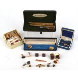 A group of items consisting of Parker pens, various pairs of cufflinks, tie clips and a boxed "Old