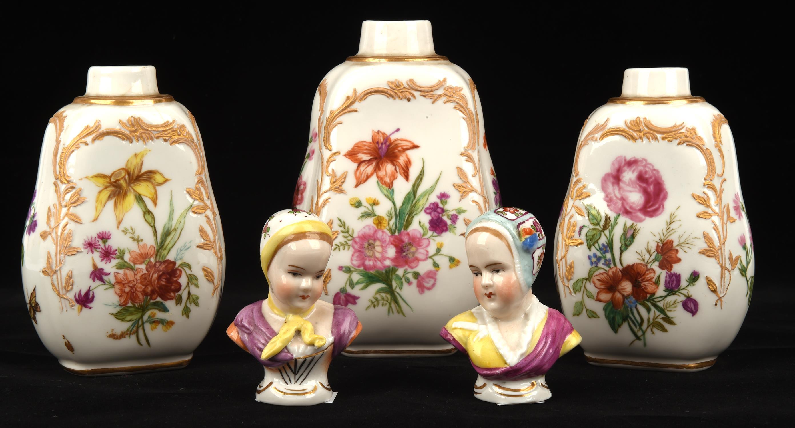 Set of three graduated porcelain vases, 19th Century, probably tea caddies lacking lids,